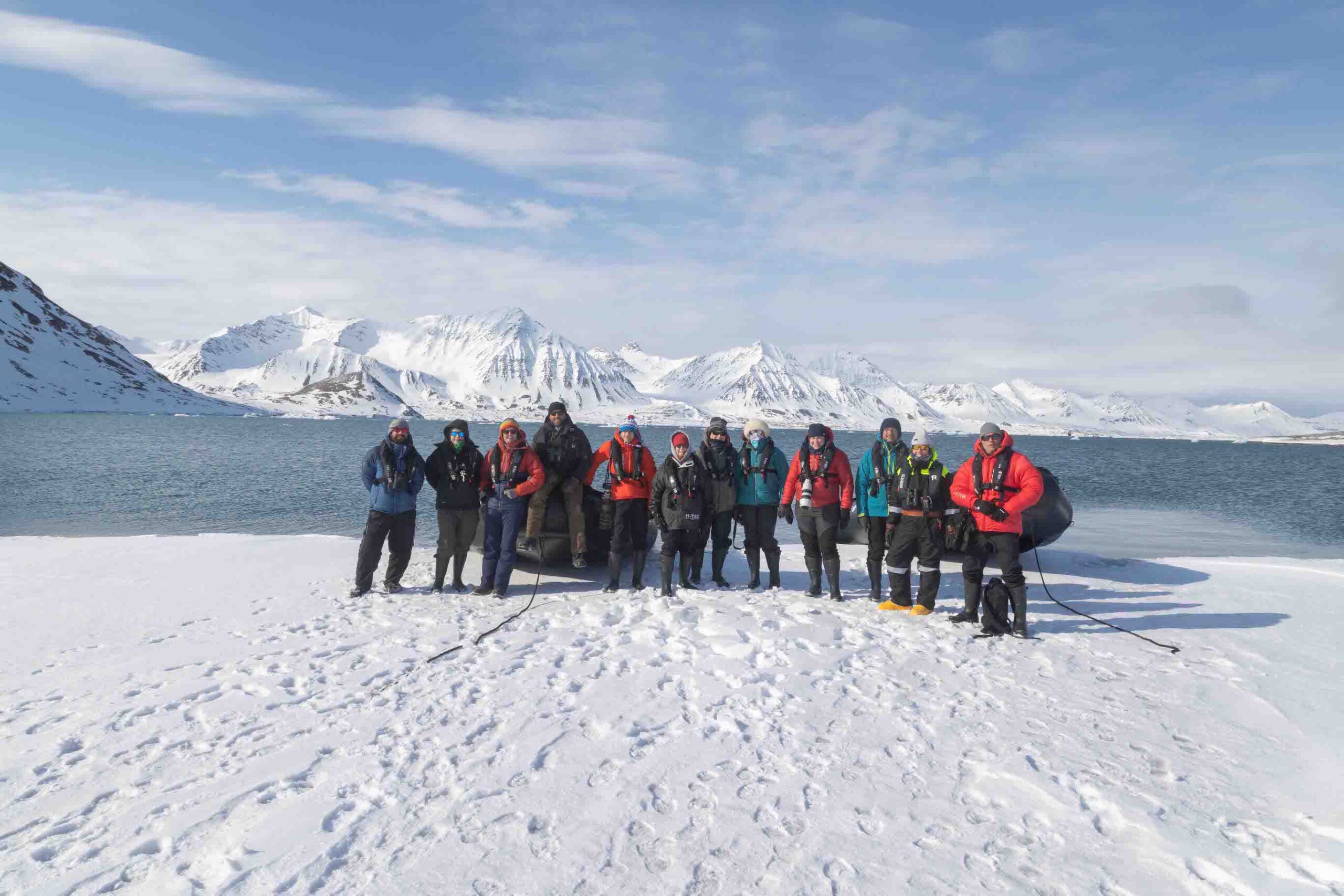Group_Photo_of_all_guests_and_guides_on_a_zodiaclanding_Svalbard_22_AndyMarsh_SecretAtlas
